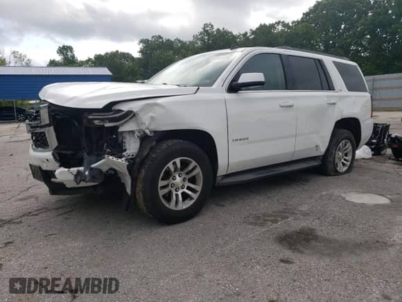2015 Chevrolet Tahoe LS with VIN 1GNSKAKC6FR284469, listed as a Copart auction lot 57643795 with 213,899 mi miles and Salvage title. Bid and sale history available at DreamBid. Image 1.