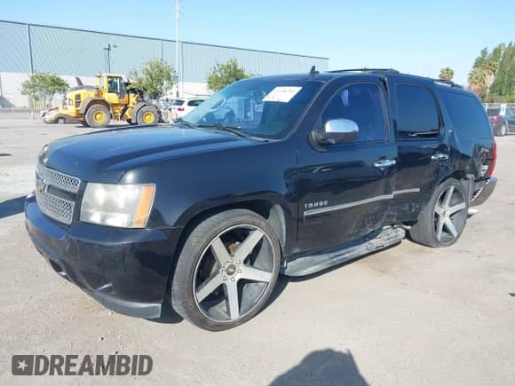 2011 Chevrolet Tahoe LTZ with VIN 1GNSCCE06BR171125, listed as a IAAI auction lot 42106289 with 152,613 mi miles and . Bid and sale history available at DreamBid. Image 17.