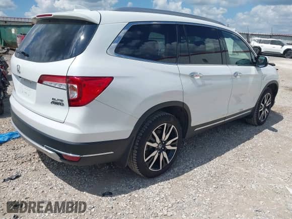 2022 Honda Pilot Elite with VIN 5FNYF6H01NB015284, listed as a IAAI auction lot 42659637 with 45,202 mi miles and . Bid and sale history available at DreamBid. Image 4.