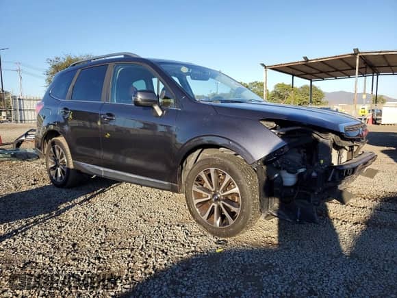 2017 Subaru Forester Touring with VIN JF2SJGWCXHH577360, listed as a Copart auction lot 86335595 with 75,471 mi miles and Salvage title. Bid and sale history available at DreamBid. Image 4.
