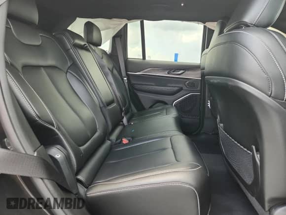 2024 Jeep Grand Cherokee Limited with VIN 1C4RJHBG5RC163087, listed as a Copart auction lot 65805715 with 8,627 mi miles and Salvage title. Bid and sale history available at DreamBid. Image 11.