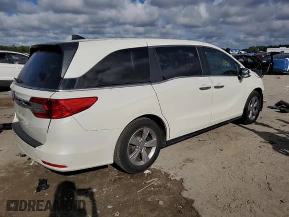 2019 Honda Odyssey EX-L with VIN 5FNRL6H76KB083330, listed as a Copart auction lot 82127835 with 97,880 mi miles and Salvage title. Bid and sale history available at DreamBid. Image 3.