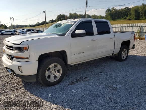 2018 Chevrolet Silverado 1500 LT z VIN 3GCUKREC4JG615182, wystawiony jako Copart lot #81304305 z przebiegiem 192 408 mil mil oraz Szkoda całkowita • Salvage title. Historia ofert i sprzedaży dostępna na DreamBid. Obrazek 1.