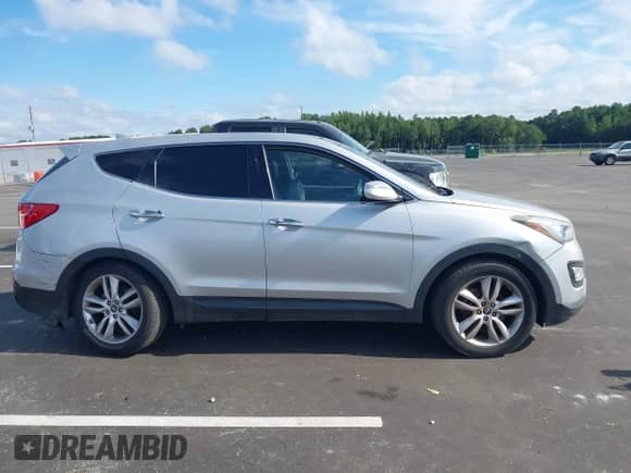 2013 Hyundai Santa Fe Sport with VIN 5XYZW3LA6DG001939, listed as a IAAI auction lot 43048039 with 180,925 mi miles and . Bid and sale history available at DreamBid. Image 13.