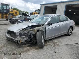 2010 Honda Accord LX-P with VIN 1HGCP2F45AA023642, listed as a Copart auction lot 71742015 with 212,049 mi miles and Salvage title. Bid and sale history available at DreamBid. Image 1.