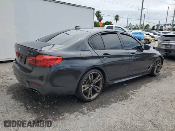 2020 BMW 5 Series M550i xDrive with VIN WBAJS7C0XLBN96601, listed as a Copart auction lot 63101515 with 46,555 mi miles and Salvage title. Bid and sale history available at DreamBid. Image 3.