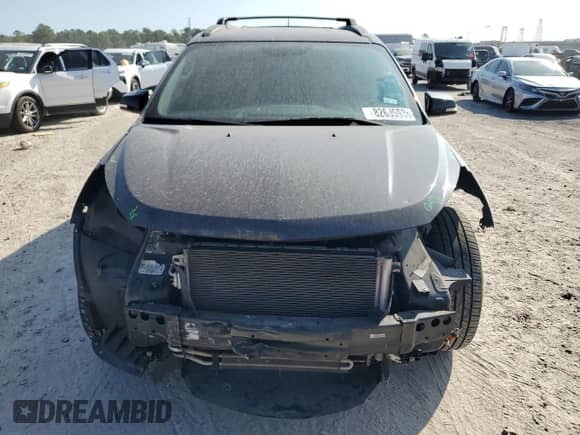 2017 Chevrolet Traverse LT с VIN 1GNKRGKD0HJ299767, выставлен на аукционе Copart как лот 82635935 с пробегом 181 379 миль миль и Списание • Salvage title. История ставок и продаж доступна на DreamBid. Изображение 5.