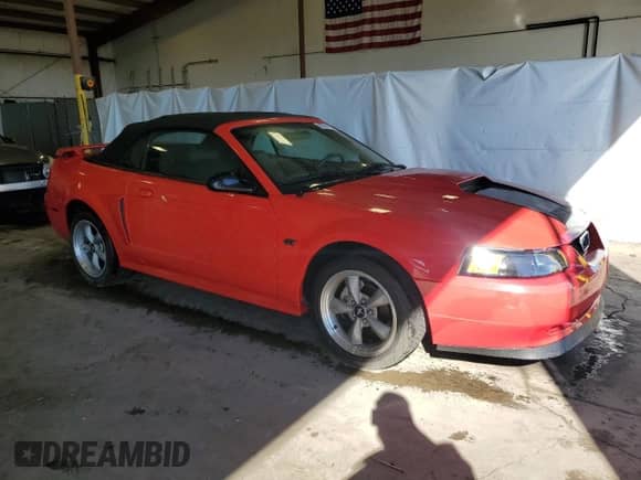 2002 Ford Mustang GT Deluxe z VIN 1FAFP45X72F157470, wystawiony jako Copart lot #84894705 z przebiegiem 6 180 mil mil oraz Szkoda całkowita • Salvage title. Historia ofert i sprzedaży dostępna na DreamBid. Obrazek 4.