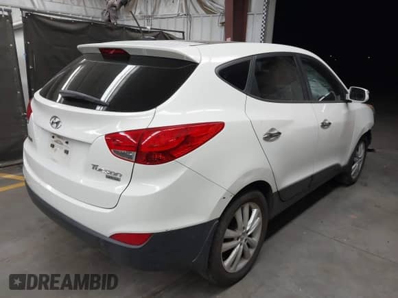 2011 Hyundai Tucson Limited with VIN KM8JU3AC6BU220687, listed as a IAAI auction lot 42828371 with 124,615 mi miles and . Bid and sale history available at DreamBid. Image 4.