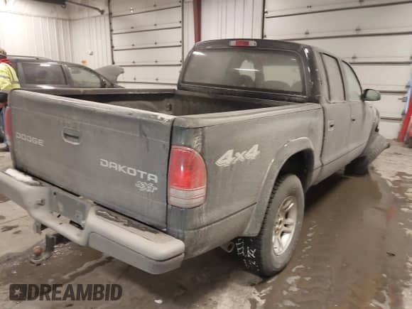 2003 Dodge Dakota Sport with VIN 1D7HG38X53S235378, listed as a IAAI auction lot 41400147 with 112,707 mi miles and . Bid and sale history available at DreamBid. Image 4.
