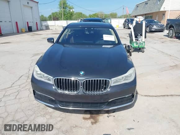 2016 BMW 7 Series 750i xDrive with VIN WBA7F2C55GG419041, listed as a IAAI auction lot 42194585 with Not provided miles and . Bid and sale history available at DreamBid. Image 12.