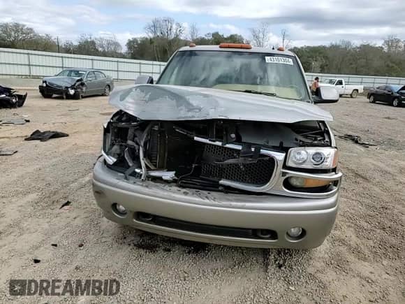 2002 GMC Sierra 1500 Denali z VIN 2GTFK69U921333849, wystawiony jako Copart lot #43101304 z przebiegiem 267 354 mil mil oraz Szkoda całkowita • Salvage title. Historia ofert i sprzedaży dostępna na DreamBid. Obrazek 11.