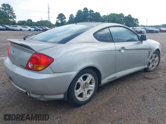2003 Hyundai Tiburon GT с VIN KMHHN65F63U036899, выставлен на аукционе IAAI как лот 42148935 с пробегом 203 485 миль миль и . История ставок и продаж доступна на DreamBid. Изображение 4.