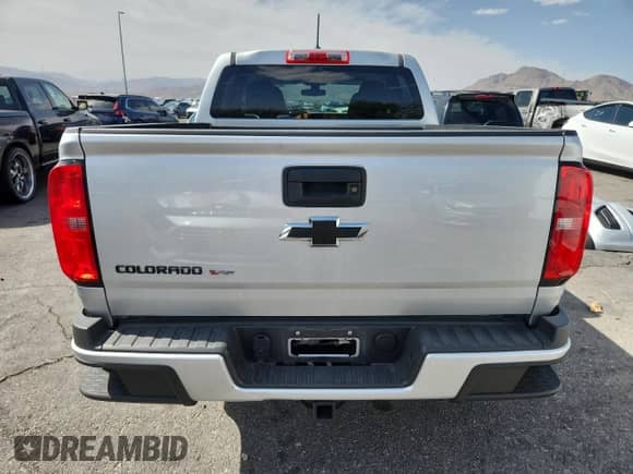 2020 Chevrolet Colorado 2WD Work Truck с VIN 1GCGSBEN2L1210316, выставлен на аукционе Copart как лот 61814565 с пробегом 12 635 миль миль и Списание • Salvage title. История ставок и продаж доступна на DreamBid. Изображение 6.