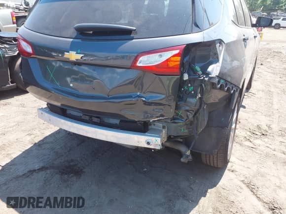 2018 Chevrolet Equinox LT z VIN 2GNAXSEV3J6293781, wystawiony jako IAAI lot #42704203 z przebiegiem 144 293 mil mil oraz . Historia ofert i sprzedaży dostępna na DreamBid. Obrazek 6.