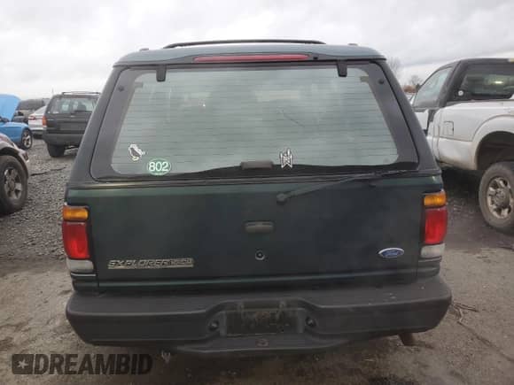 1997 Ford Explorer with VIN 1FMCU24E5VUB71602, listed as a Copart auction lot 87081674 with 193,534 mi miles and Salvage title. Bid and sale history available at DreamBid. Image 6.
