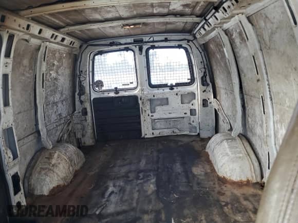 2008 Chevrolet Express Cargo с VIN 1GCFG15X781227581, выставлен на аукционе Copart как лот 82034175 с пробегом 214 404 миль миль и Списание • Salvage title. История ставок и продаж доступна на DreamBid. Изображение 10.