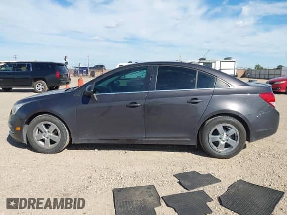 2016 Chevrolet Cruze LT z VIN 1G1PE5SB7G7183421, wystawiony jako IAAI lot #43298282 z przebiegiem 60 846 mil mil oraz . Historia ofert i sprzedaży dostępna na DreamBid. Obrazek 14.