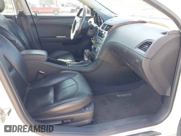 2012 Chevrolet Malibu LTZ z VIN 1G1ZG5E75CF156969, wystawiony jako IAAI lot #42576487 z przebiegiem 107 729 mil mil oraz . Historia ofert i sprzedaży dostępna na DreamBid. Obrazek 5.