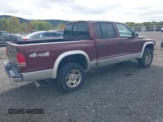 2003 Dodge Dakota SLT z VIN 1D7HG48N43S134367, wystawiony jako IAAI lot #43455942 z przebiegiem 220 079 mil mil oraz . Historia ofert i sprzedaży dostępna na DreamBid. Obrazek 4.