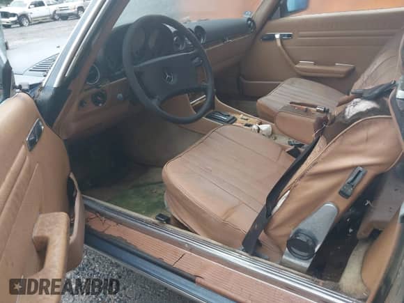 1985 Mercedes-Benz 380 with VIN WDBBA45C1FA018962, listed as a IAAI auction lot 42449076 with 142,436 mi miles and . Bid and sale history available at DreamBid. Image 5.