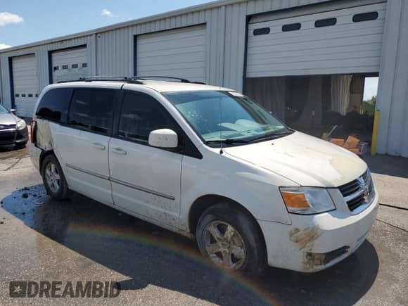 2010 Dodge Grand Caravan SXT with VIN 2D4RN5D10AR460200, listed as a Copart auction lot 71303905 with 172,308 mi miles and Salvage title. Bid and sale history available at DreamBid. Image 4.