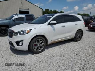 2017 Kia Sorento SXL z VIN 5XYPKDA57HG205217, wystawiony jako Copart lot #68656805 z przebiegiem 138 199 mil mil oraz Szkoda całkowita • Salvage title. Historia ofert i sprzedaży dostępna na DreamBid. Obrazek 1.