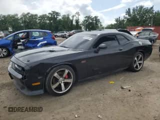 2011 Dodge Challenger SRT-8 с VIN 2B3CJ7DJ6BH561969, выставлен на аукционе Copart как лот 64253455 с пробегом 105 813 миль миль и Чистый • Clean title. История ставок и продаж доступна на DreamBid. Изображение 1.