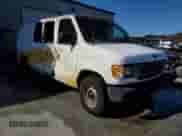 2000 Ford Econoline Cargo with VIN 1FTRE14L2YHB70344, listed as a Copart auction lot 87704865 with 179,233 mi miles and Non repairable. Bid and sale history available at DreamBid. Image 4.