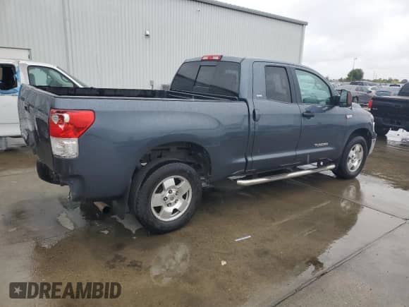 2010 Toyota Tundra z VIN 5TFRY5F11AX082018, wystawiony jako Copart lot #85727145 z przebiegiem 310 488 mil mil oraz Szkoda całkowita • Salvage title. Historia ofert i sprzedaży dostępna na DreamBid. Obrazek 3.