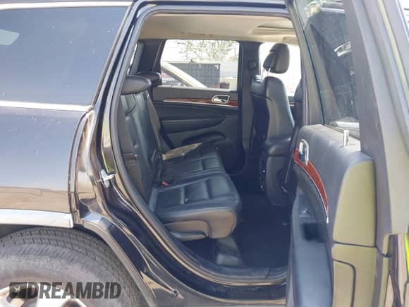 2012 Jeep Grand Cherokee Limited z VIN 1C4RJEBG0CC195421, wystawiony jako IAAI lot #42975299 z przebiegiem 152 546 mil mil oraz . Historia ofert i sprzedaży dostępna na DreamBid. Obrazek 8.