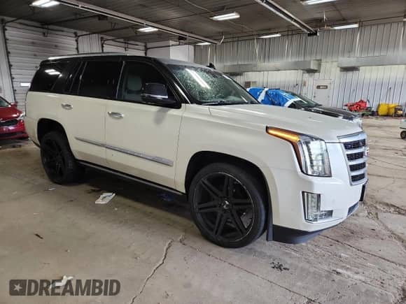 2015 Cadillac Escalade Premium z VIN 1GYS4NKJ4FR710193, wystawiony jako Copart lot #71468005 z przebiegiem 122 072 mil mil oraz Czysty tytuł • Clean title. Historia ofert i sprzedaży dostępna na DreamBid. Obrazek 4.