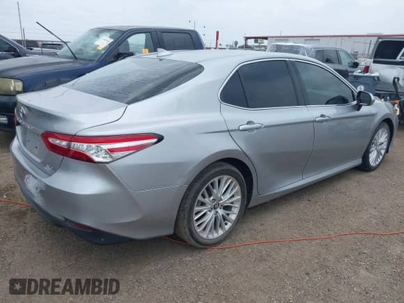2020 Toyota Camry Hybrid XLE z VIN 4T1F31AK0LU528282, wystawiony jako IAAI lot #42381278 z przebiegiem 91 478 mil mil oraz . Historia ofert i sprzedaży dostępna na DreamBid. Obrazek 4.