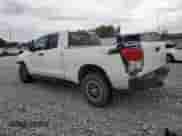 2010 Toyota Tundra с VIN 5TFUY5F18AX154990, выставлен на аукционе Copart как лот 82358065 с пробегом 292 085 миль миль и Чистый • Clean title. История ставок и продаж доступна на DreamBid. Изображение 2.