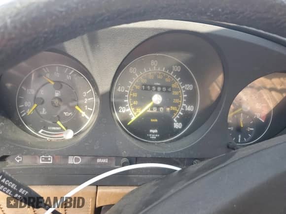 1983 Mercedes-Benz 380 SL with VIN WDBBA45A3DB027653, listed as a Copart auction lot 58926515 with 115,854 mi miles and Salvage title. Bid and sale history available at DreamBid. Image 9.