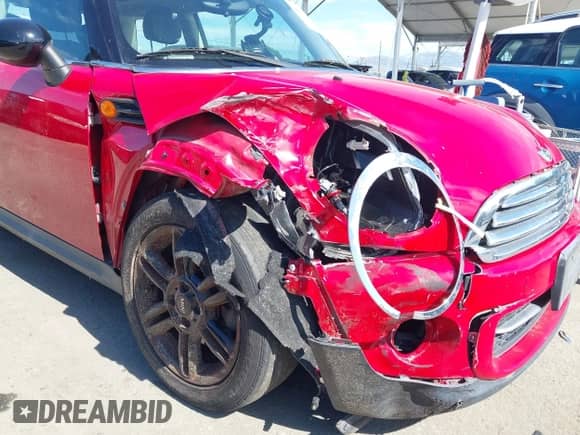 2012 MINI Hardtop z VIN WMWSU3C52CT541816, wystawiony jako IAAI lot #43513419 z przebiegiem 55 436 mil mil oraz . Historia ofert i sprzedaży dostępna na DreamBid. Obrazek 6.