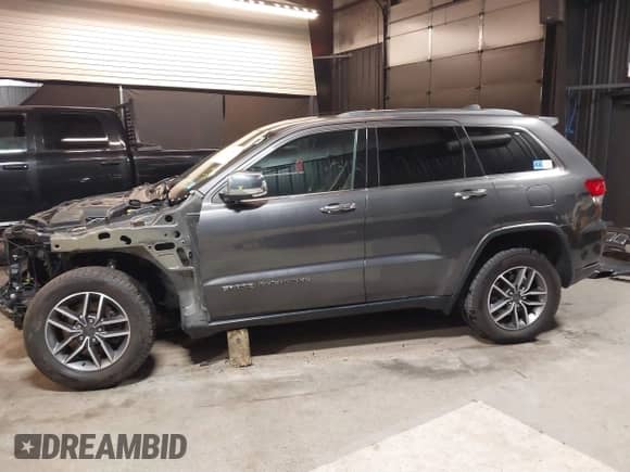2021 Jeep Grand Cherokee 80th Anniversary with VIN 1C4RJFBG2MC767757, listed as a IAAI auction lot 42008442 with 98,227 mi miles and . Bid and sale history available at DreamBid. Image 15.