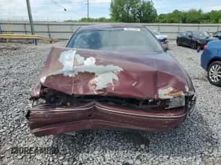 1991 Chevrolet Caprice z VIN 1G1BN53E9MW187619, wystawiony jako Copart lot #55291845 z przebiegiem 1 433 530 mil mil oraz Szkoda całkowita • Salvage title. Historia ofert i sprzedaży dostępna na DreamBid. Obrazek 5.