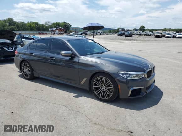2019 BMW 5 Series M550i xDrive с VIN WBAJB9C58KB464667, выставлен на аукционе Copart как лот 68863795 с пробегом 31 401 миль миль и Списание • Salvage title. История ставок и продаж доступна на DreamBid. Изображение 4.