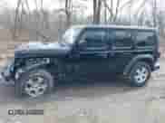 2022 Jeep Wrangler Unlimited Sport S с VIN 1C4HJXDG1NW142202, выставлен на аукционе IAAI как лот 41864413 с пробегом 100 647 миль миль и . История ставок и продаж доступна на DreamBid. Изображение 13.