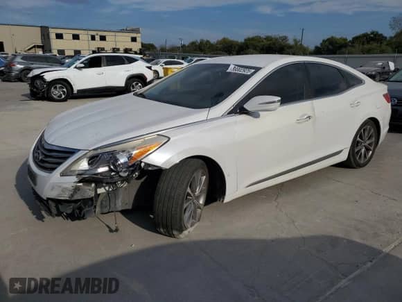 2015 Hyundai Azera Limited с VIN KMHFH4JG8FA434302, выставлен на аукционе Copart как лот 86802925 с пробегом 163 956 миль миль и Списание • Salvage title. История ставок и продаж доступна на DreamBid. Изображение 1.