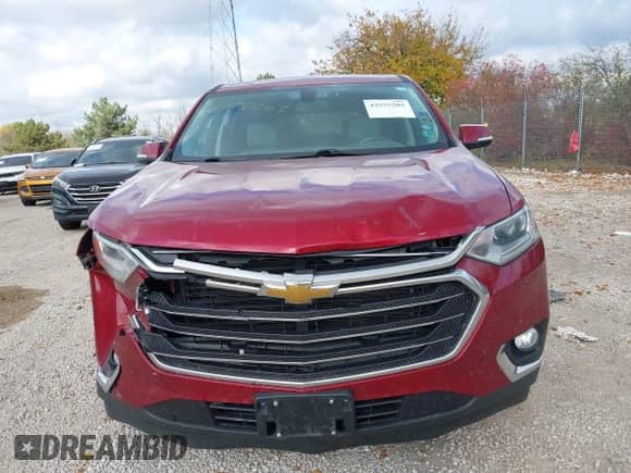2018 Chevrolet Traverse LT Cloth z VIN 1GNEVGKW5JJ235448, wystawiony jako IAAI lot #43555205 z przebiegiem 111 945 mil mil oraz . Historia ofert i sprzedaży dostępna na DreamBid. Obrazek 6.