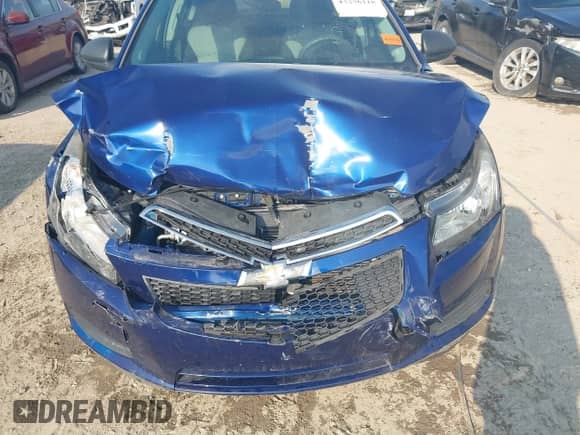 2013 Chevrolet Cruze LS with VIN 1G1PA5SH6D7120130, listed as a IAAI auction lot 43256118 with 106,722 mi miles and . Bid and sale history available at DreamBid. Image 6.