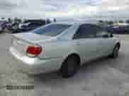 2005 Toyota Camry STD с VIN JTDBE32K453033874, выставлен на аукционе Copart как лот 80390895 с пробегом 61 464 миль миль и Списание • Salvage title. История ставок и продаж доступна на DreamBid. Изображение 3.