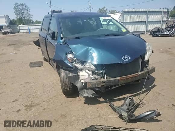 2012 Toyota Sienna with VIN 5TDZK3DC4CS237227, listed as a Copart auction lot 68947005 with 219,993 mi miles and Salvage title. Bid and sale history available at DreamBid. Image 14.