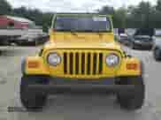 2000 Jeep Wrangler SE with VIN 1J4FA29P0YP775110, listed as a Copart auction lot 71498795 with 72,782 mi miles and Clean title. Bid and sale history available at DreamBid. Image 5.