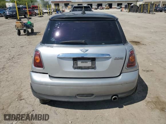 2007 MINI Hardtop with VIN WMWMF33597TT56851, listed as a Copart auction lot 68785325 with 140,683 mi miles and Salvage title. Bid and sale history available at DreamBid. Image 6.