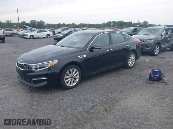2016 Kia Optima EX with VIN 5XXGU4L38GG045521, listed as a IAAI auction lot 43331308 with 147,004 mi miles and . Bid and sale history available at DreamBid. Image 2.
