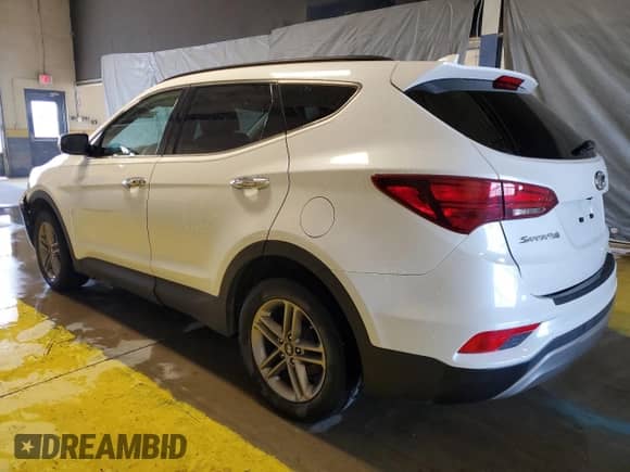2018 Hyundai Santa Fe 2.4L z VIN 5NMZUDLB1JH062301, wystawiony jako Copart lot #69343165 z przebiegiem 96 345 mil mil oraz Czysty tytuł • Clean title. Historia ofert i sprzedaży dostępna na DreamBid. Obrazek 2.