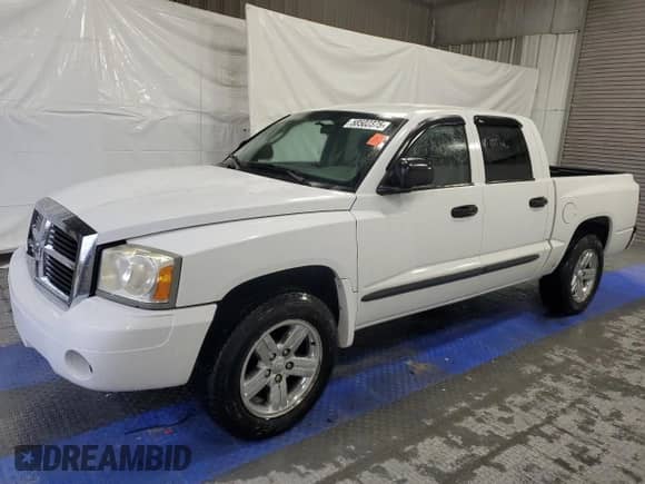 2007 Dodge Dakota SLT с VIN 1D7HE48P87S182418, выставлен на аукционе Copart как лот 58502375 с пробегом 78 305 миль миль и Списание • Salvage title. История ставок и продаж доступна на DreamBid. Изображение 1.